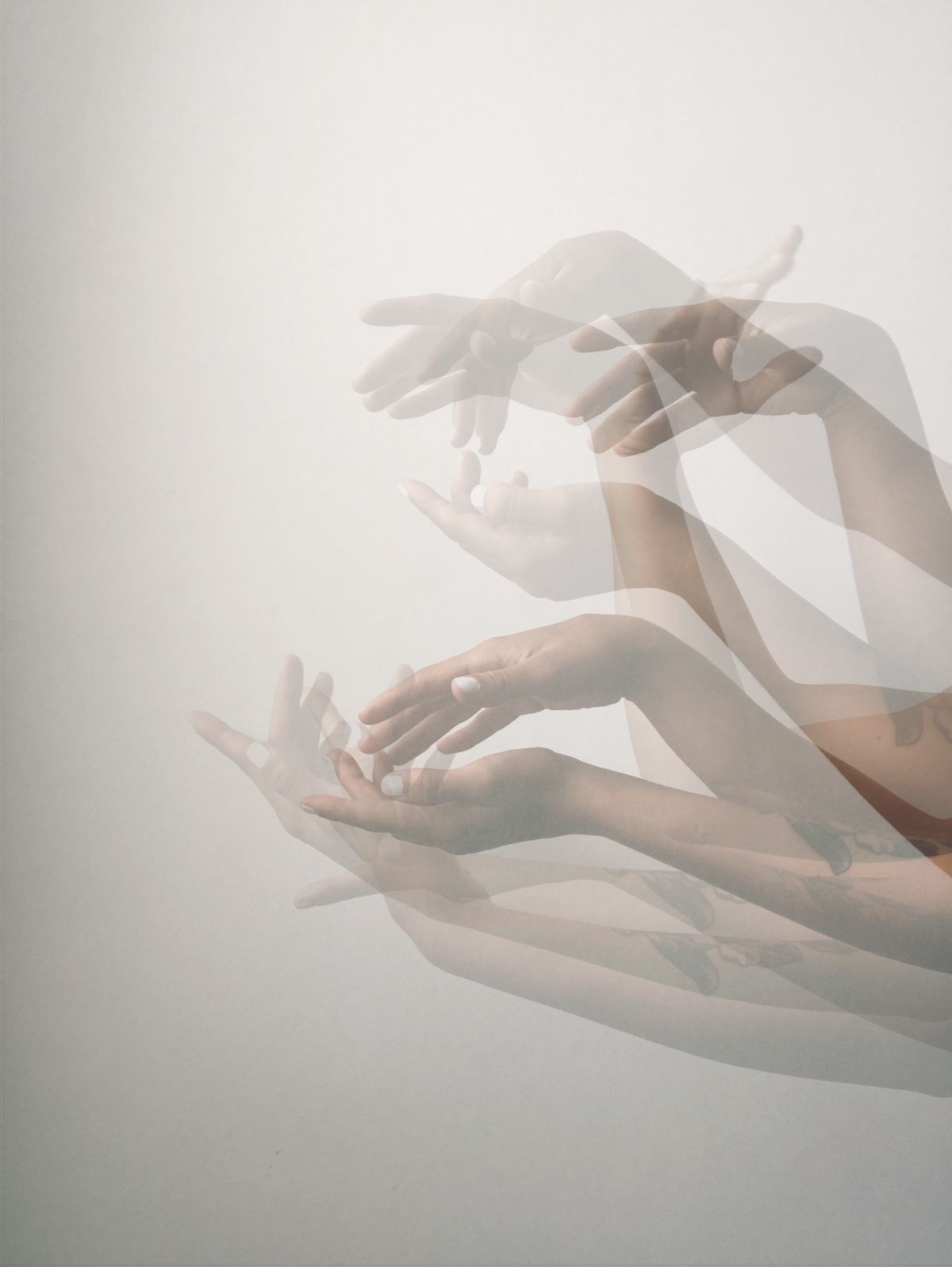 Soft overlapping images of open hands